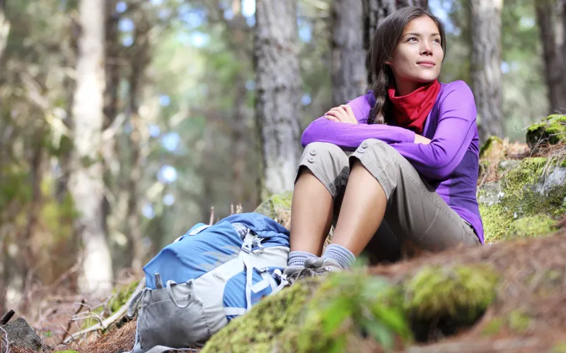 Lady hiking in the woods