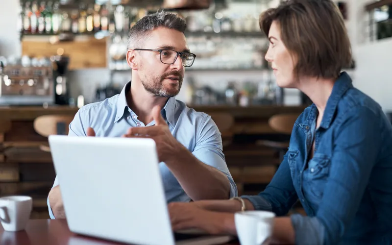 Couple talking at coffee shop