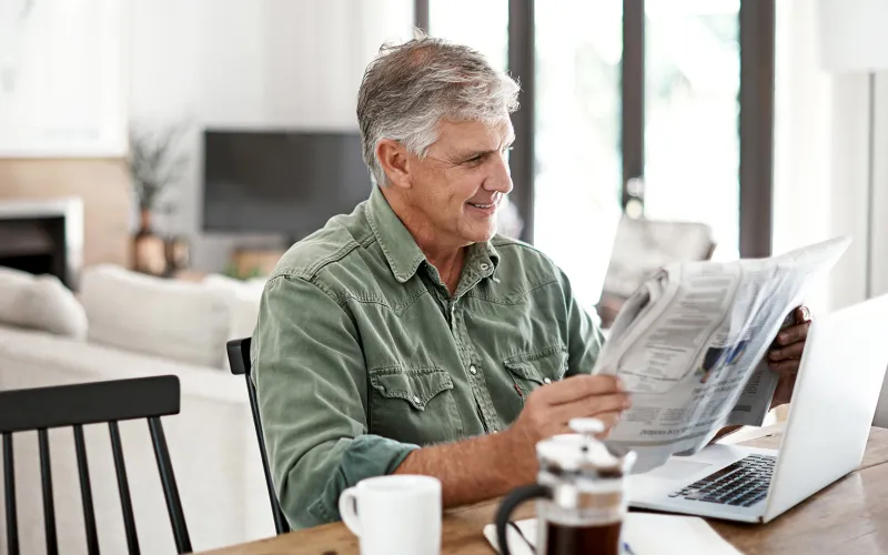 Man reading the financial news