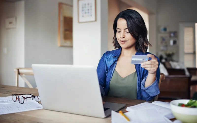 Woman researching credit cards online