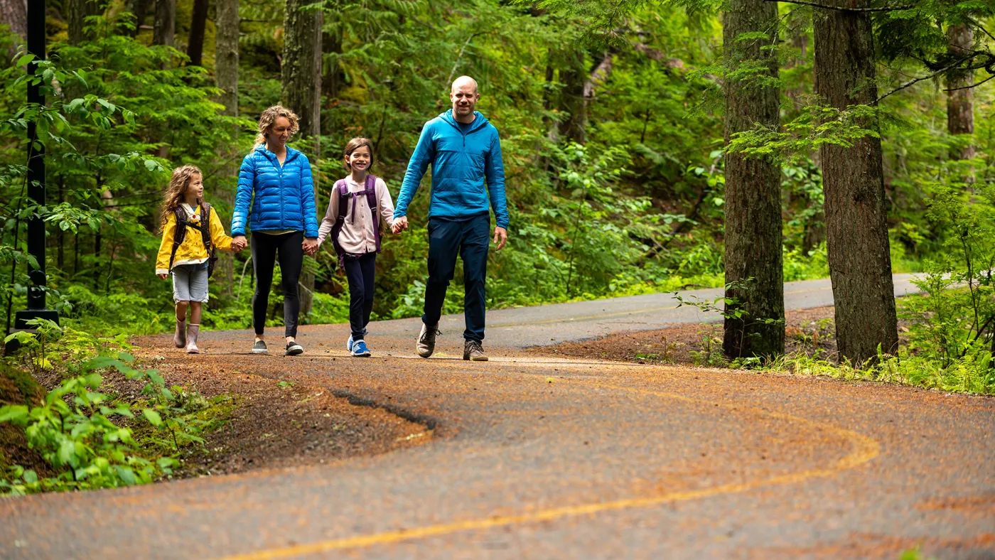 Family walking in forest