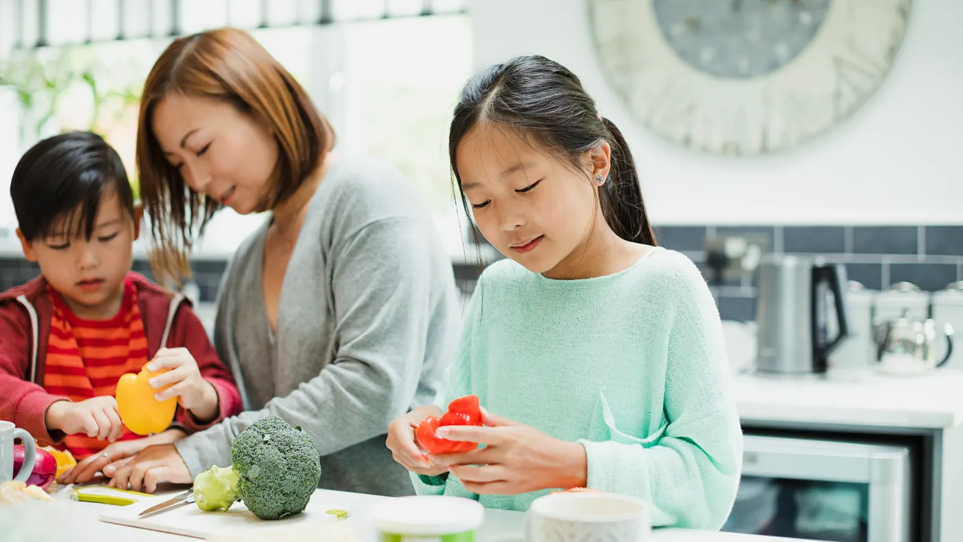 Family making a meal together