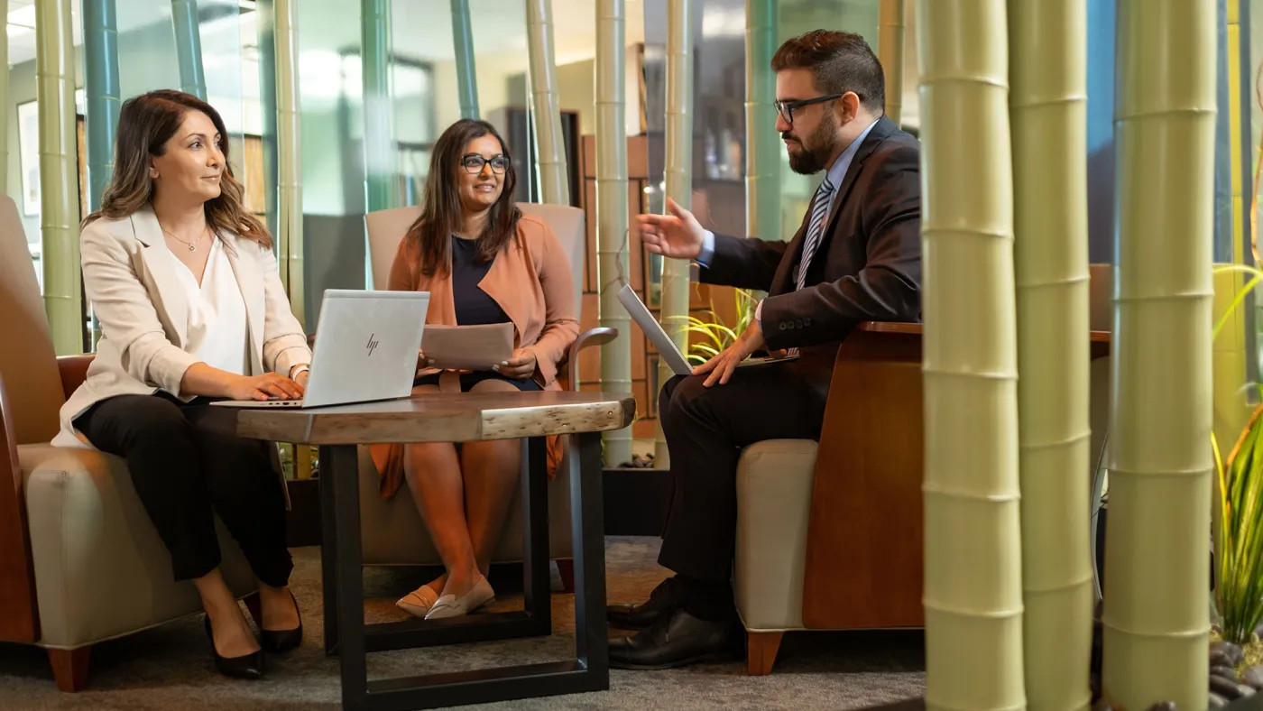 BlueShore employees meeting at the office
