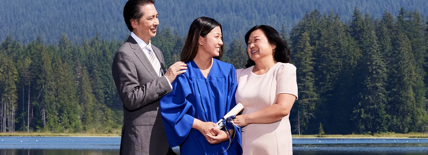 Graduation scene showing a family.