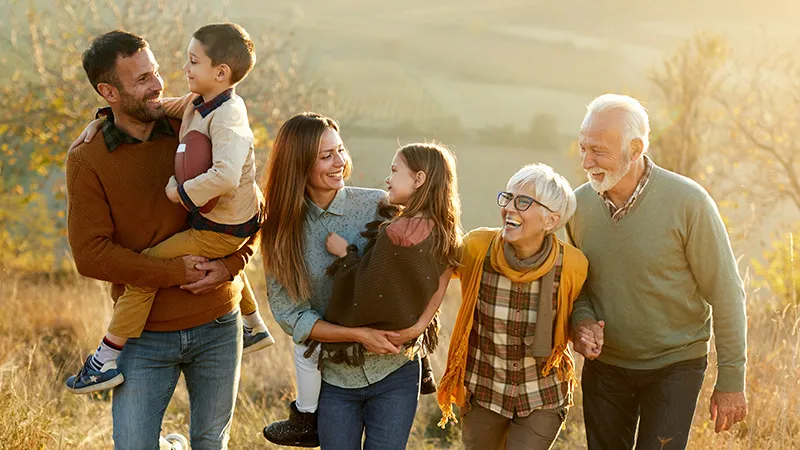 Generational family enjoying a fall day