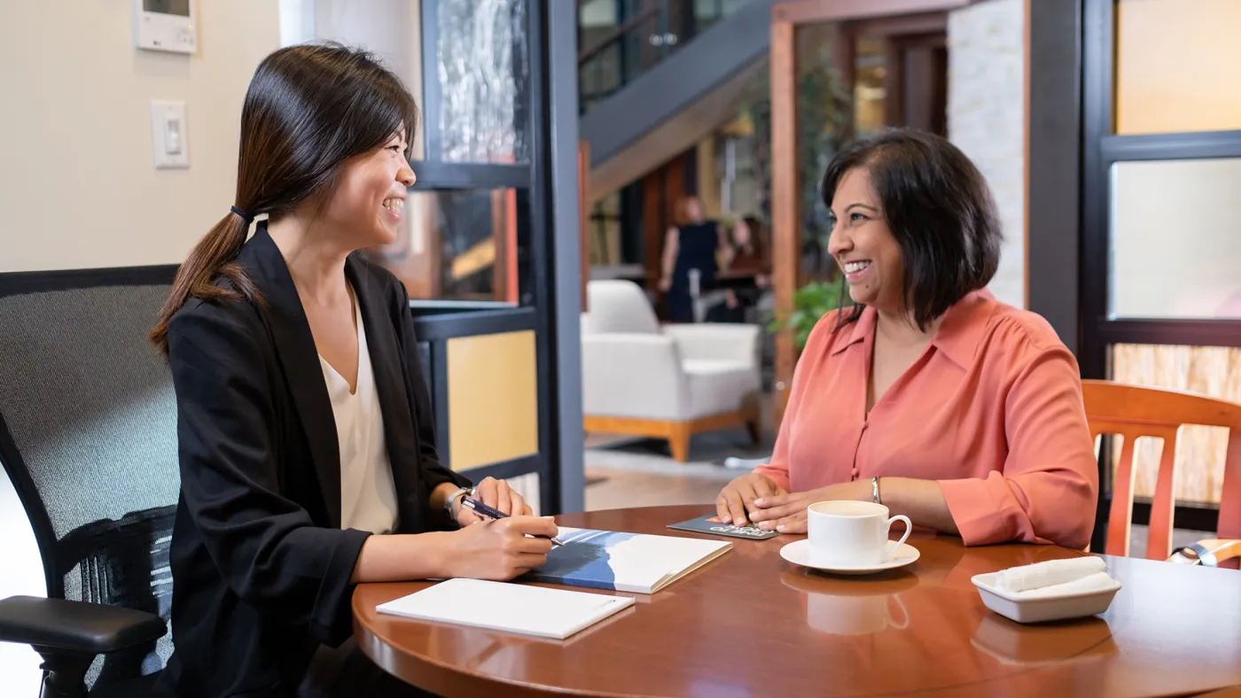 Woman talking with her advisor