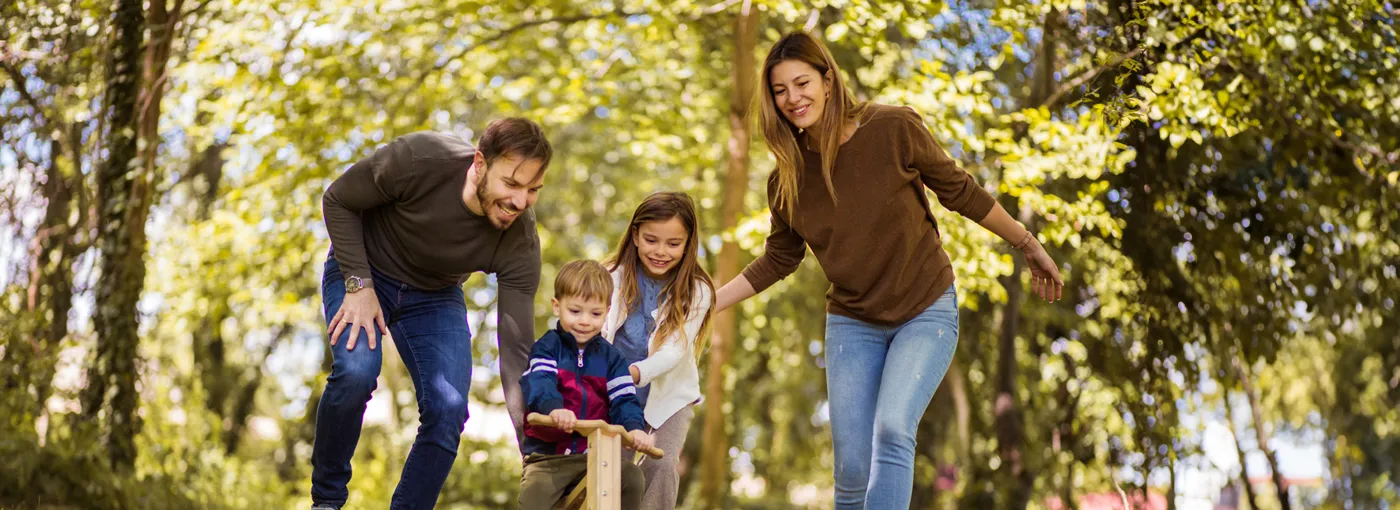 Family out for a walk in a forest