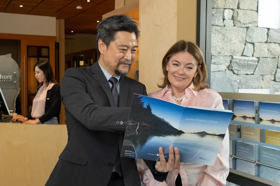 A client speaking with a financial advisor at BlueShore Financial.