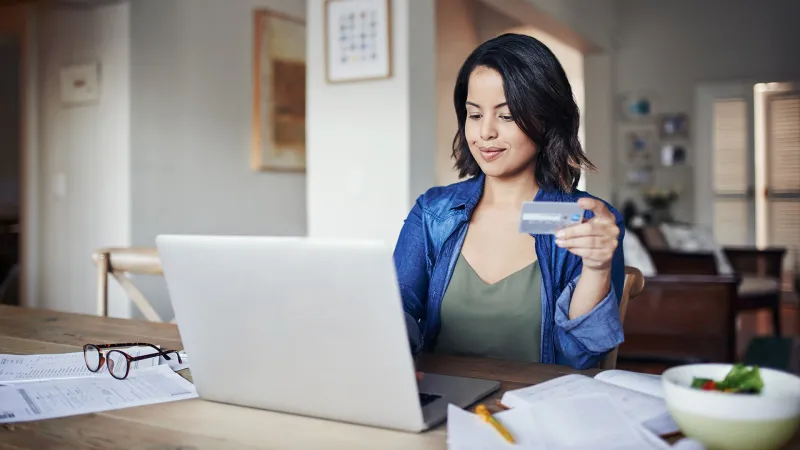 Woman checking her credit card balance online