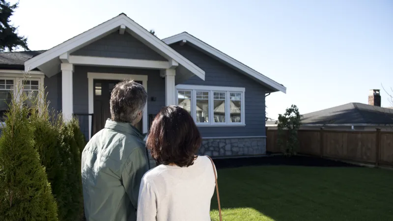 Couple looking at home for sale